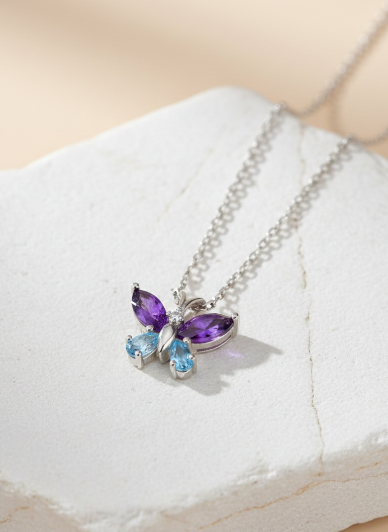Blue Topaz And Amethyst Butterfly Necklace in 92.5 Sterling Silver