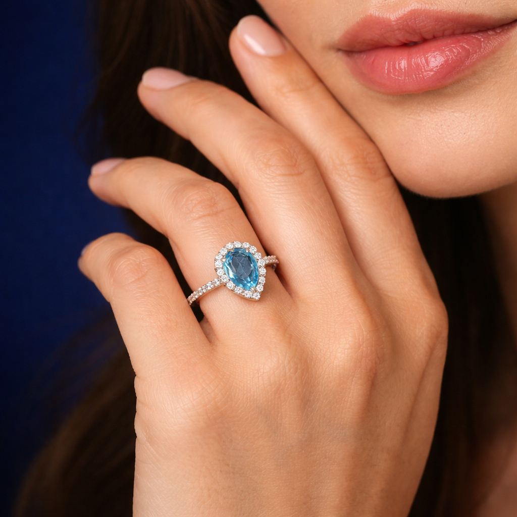 Pear Cut Blue Topaz Ring in 92.5 Sterling Silver