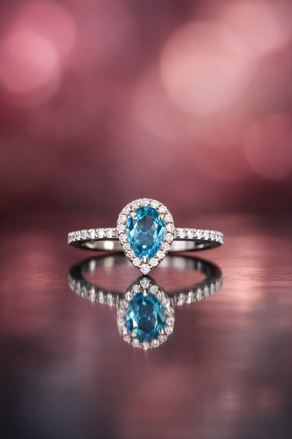 Pear Cut Blue Topaz Ring in 92.5 Sterling Silver