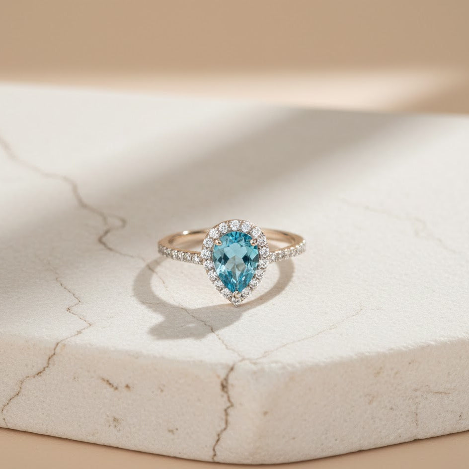 Pear Cut Blue Topaz Ring in 92.5 Sterling Silver
