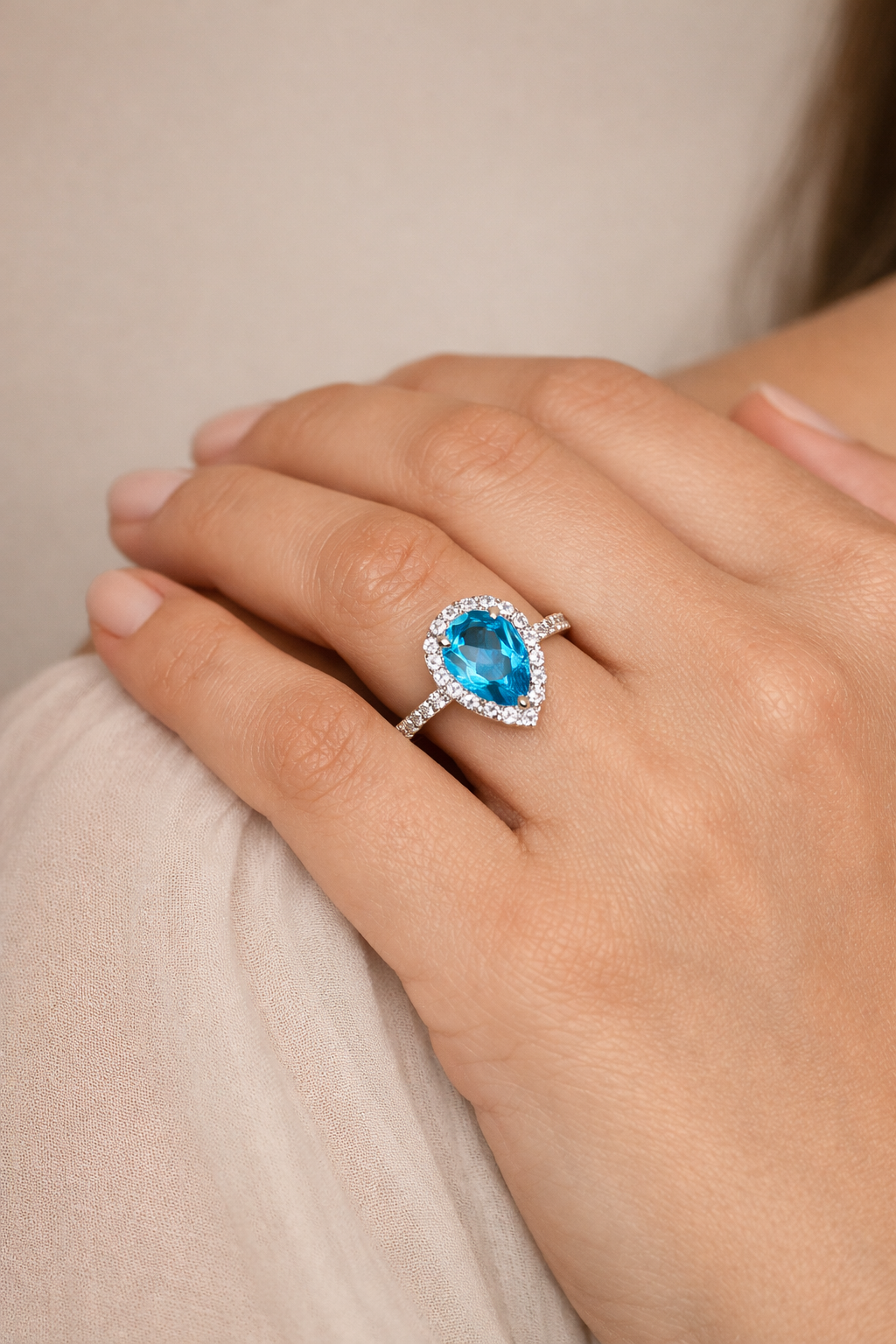 Pear Cut Blue Topaz Ring in 92.5 Sterling Silver