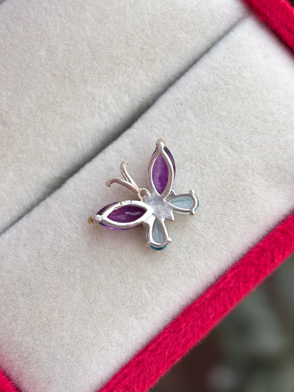 Blue Topaz And Amethyst Butterfly Necklace in 92.5 Sterling Silver