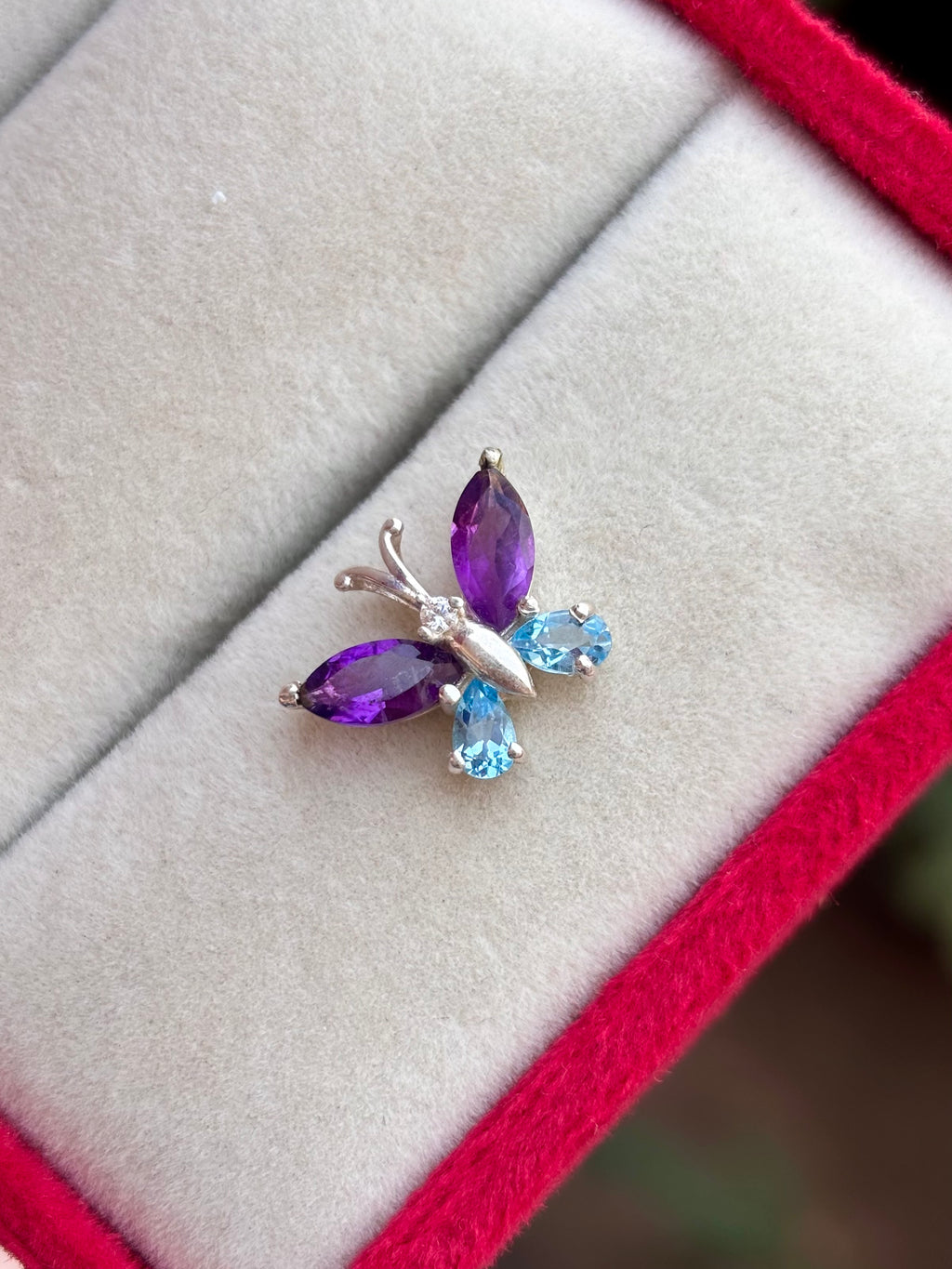 Blue Topaz And Amethyst Butterfly Necklace in 92.5 Sterling Silver