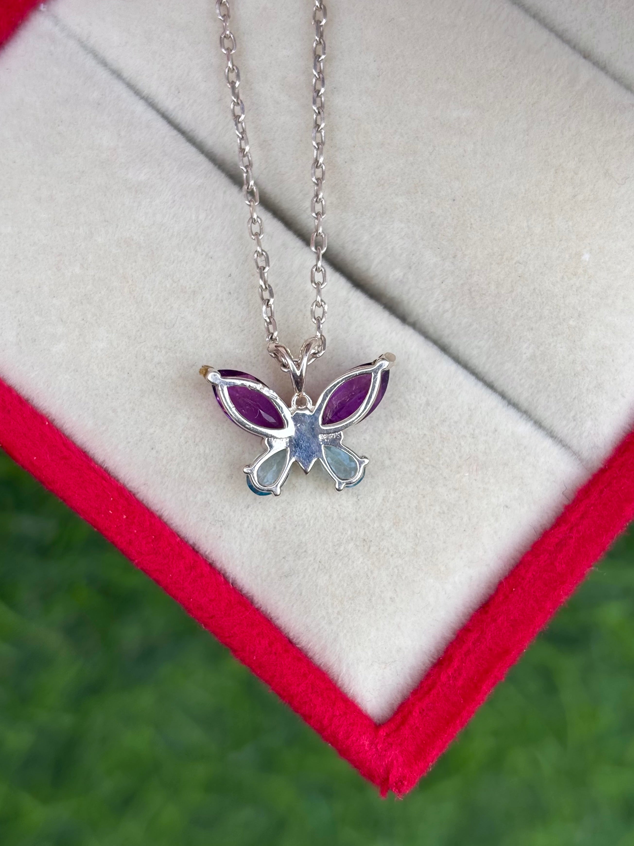 Blue Topaz And Amethyst Butterfly Necklace in 92.5 Sterling Silver