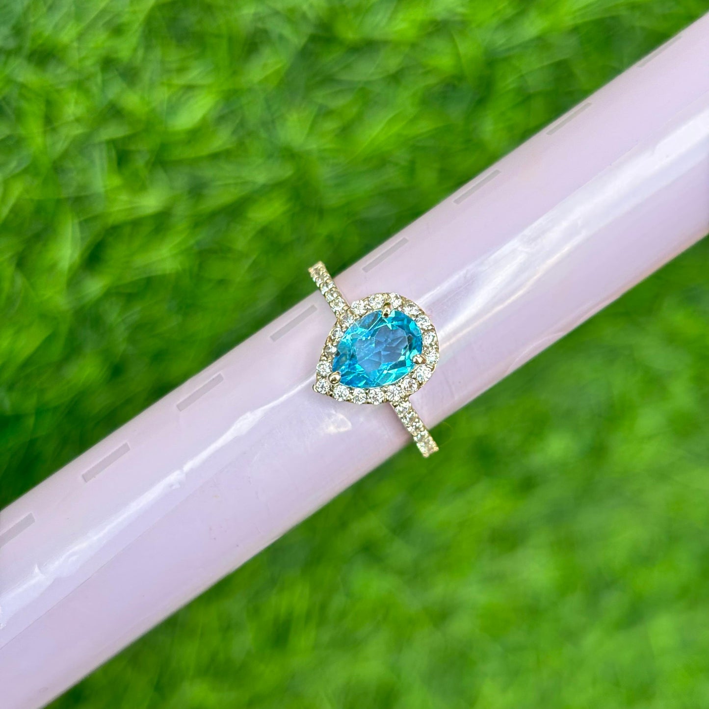 Pear Cut Blue Topaz Ring in 92.5 Sterling Silver