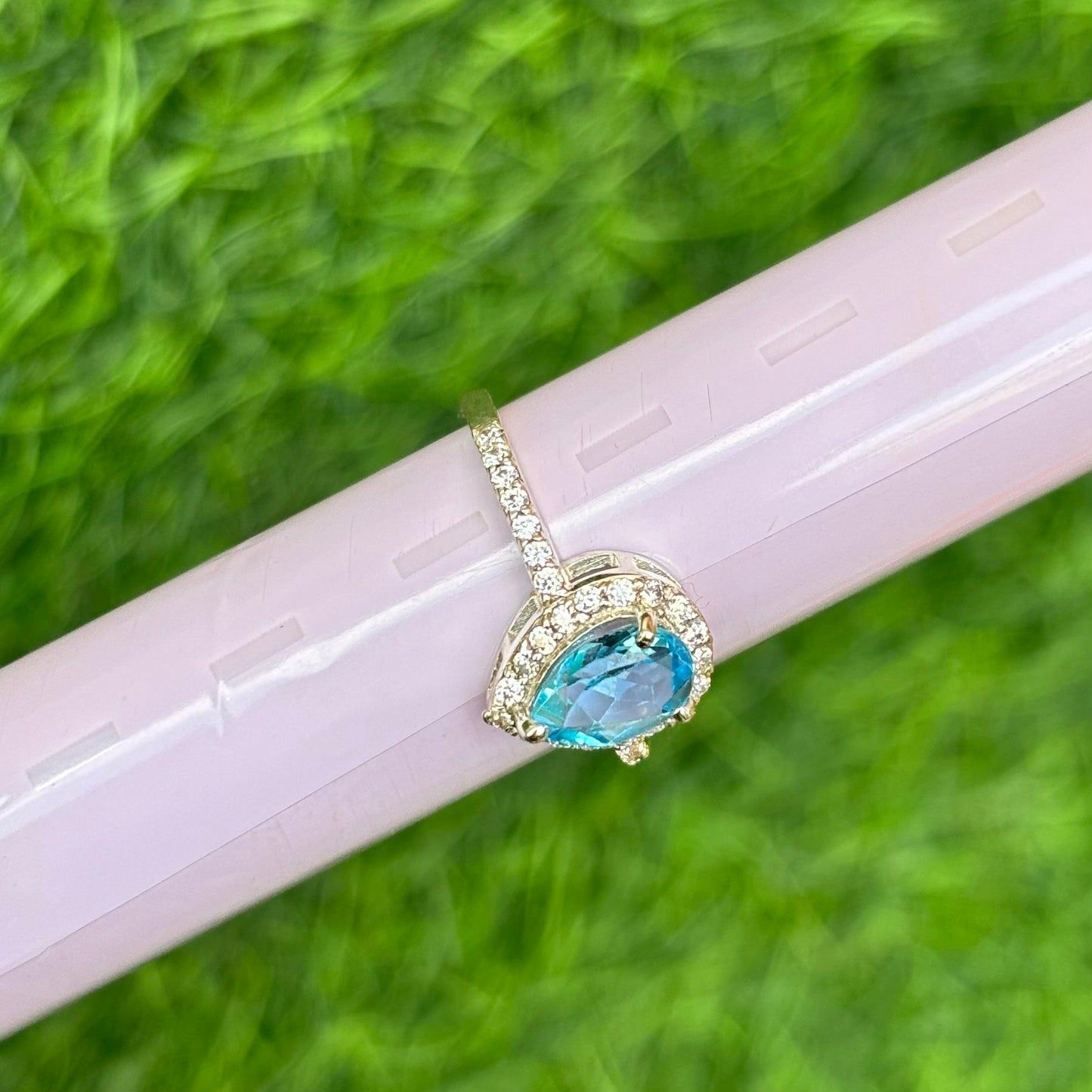 Pear Cut Blue Topaz Ring in 92.5 Sterling Silver